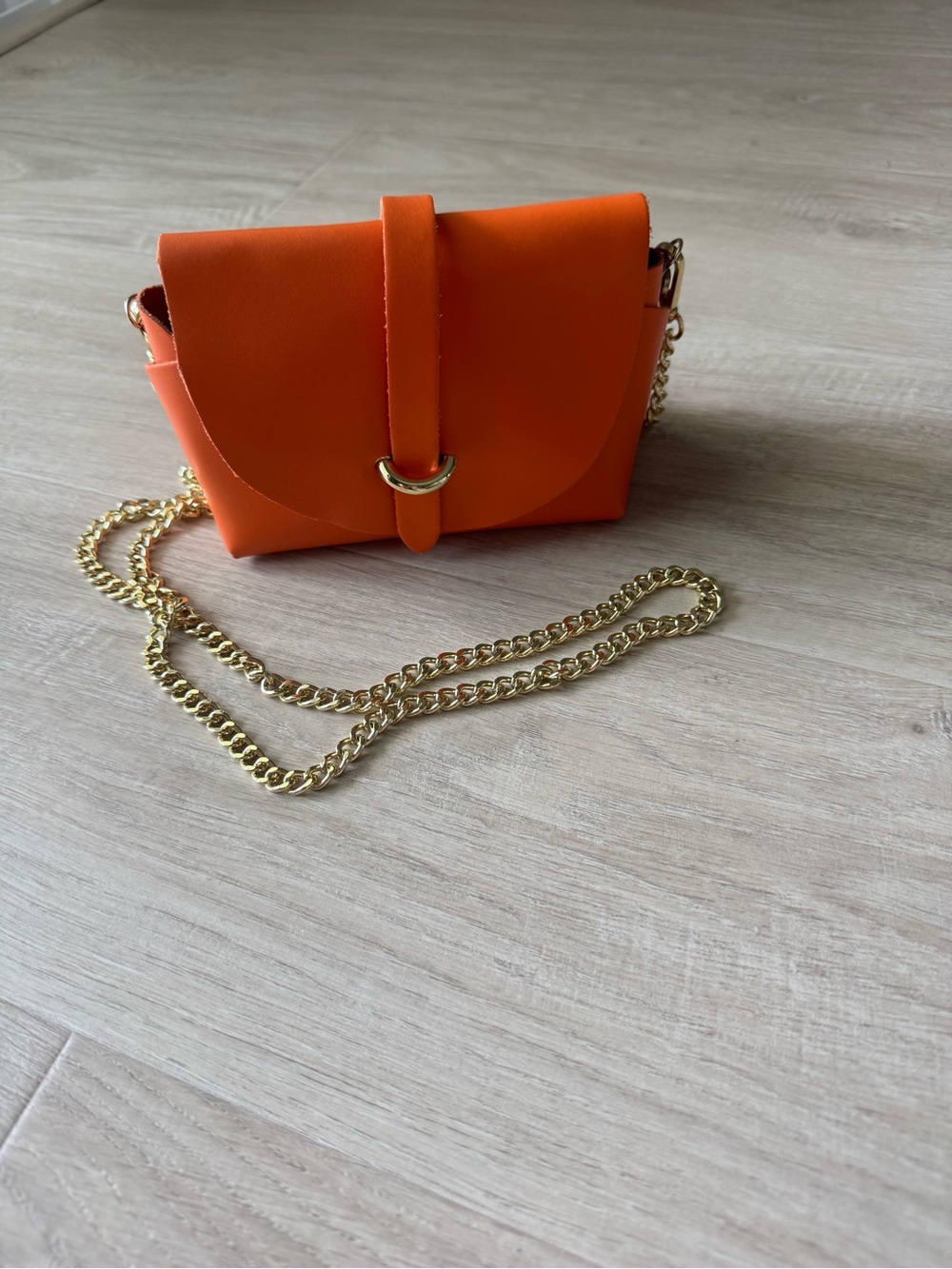 Orange Crossbody Bag with Gold Chain Strap